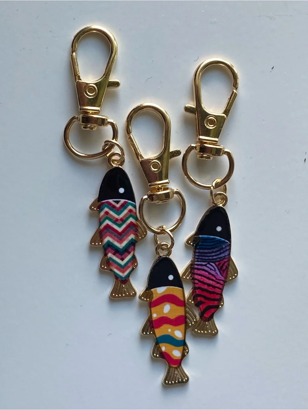 Trio of Colorful Enamel Fish Keychains with Gold Hardware